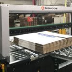 The SIG-C Automatic Corrugated Bundler being used for boxes